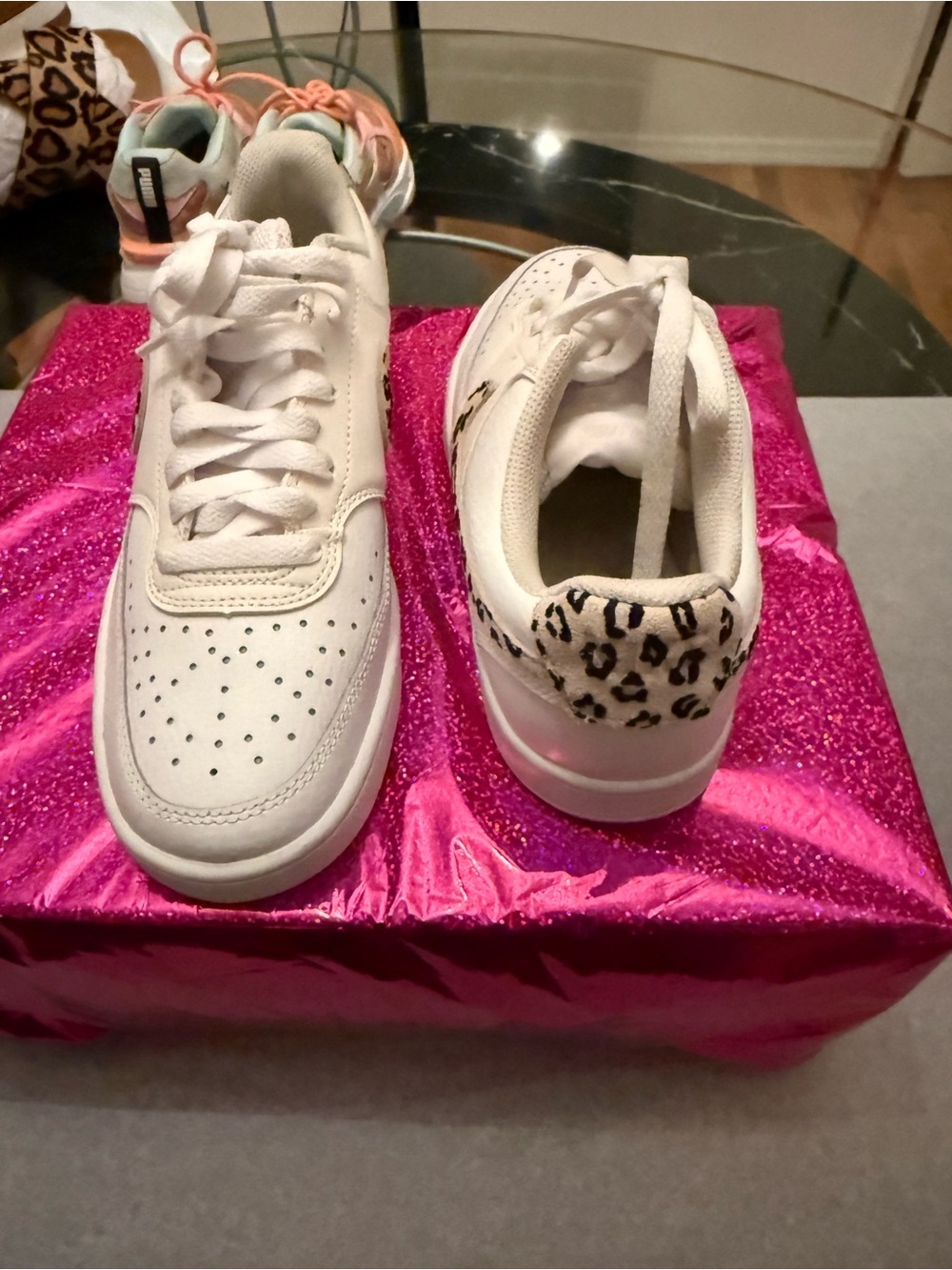 Nike Women’s White Sneakers with Leopard Heel Accent